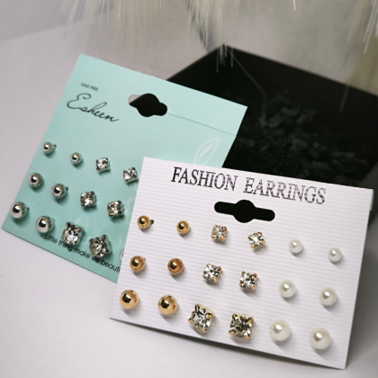 Stiilne pärlite ja kristallide imitatsiooniga kõrvarõngaste komplekt