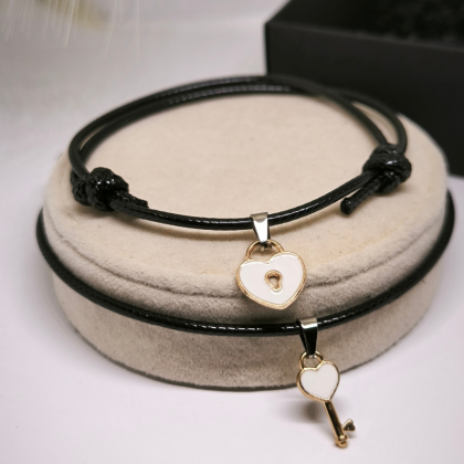 Käevõrude komplekt paarile "Võti südamesse"