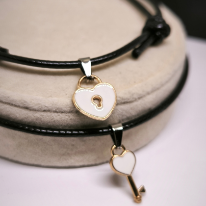 Käevõrude komplekt paarile "Võti südamesse"