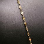 Kuu kujuline ripats sõnadega "Ma armastan sind" (100 keeles)