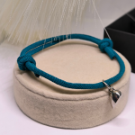 Paaridele mõeldud käevõrude komplekt südamekujulise ripatsiga