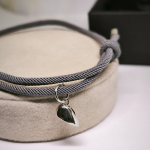 Kangast käevõrude komplekt ripatsiga