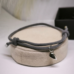 Kangast käevõrude komplekt ripatsiga