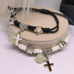 Helendavad käevõrud metallristi kujuga elementidega