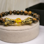 Tiigrisilma helmestega käevõru "Draakonid"