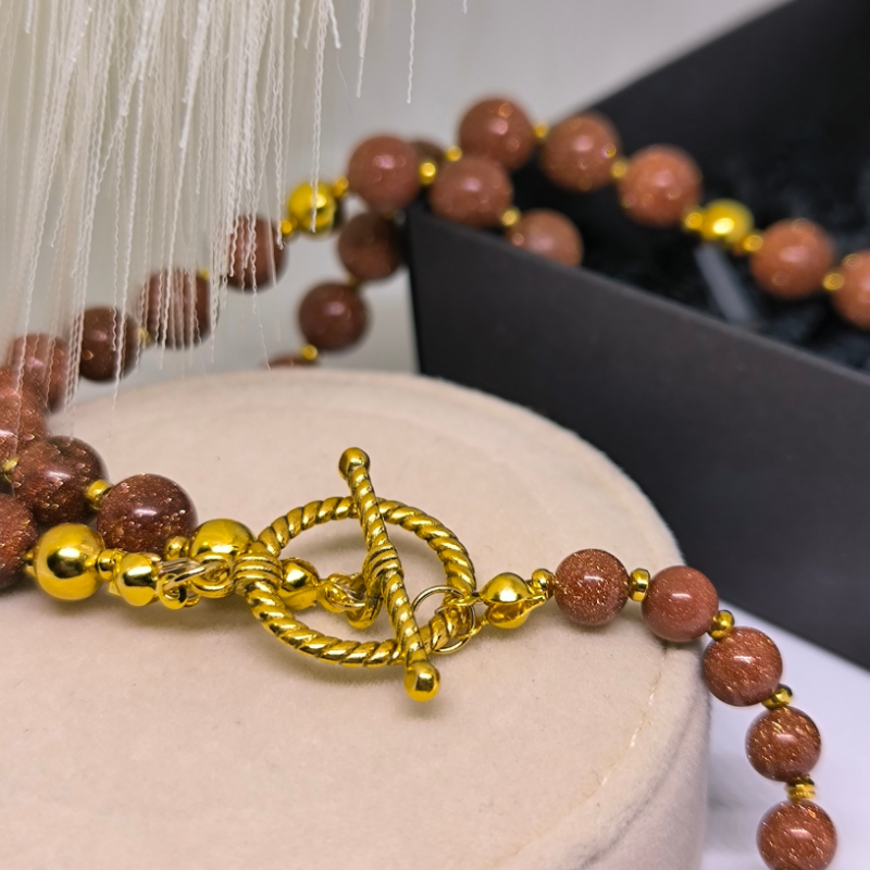 Luksuslik päikesekiviga kaelakee „Kuldne Päikesetõus“