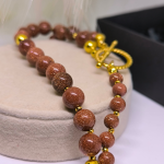 Luksuslik päikesekiviga kaelakee „Kuldne Päikesetõus“