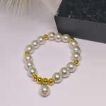 Klaashelmestest käevõru kuldsete aktsentidega „Pärlite elegants“