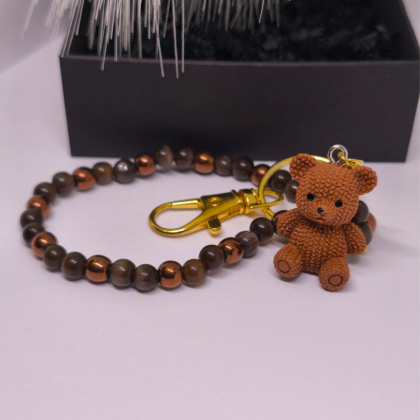 Käsitsi valmistatud käekotid ja võtmehoidja „Karu“