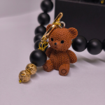 Käsitööna valminud kaelakee „Karu elegants“