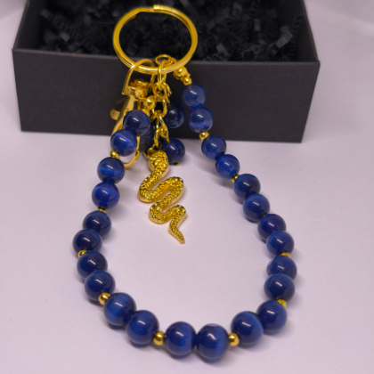 Käsitööna valminud käekotid ja võtmehoidja „Öö madu“