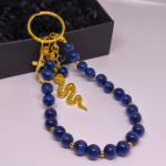 Käsitööna valminud käekotid ja võtmehoidja „Öö madu“