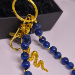 Käsitööna valminud käekotid ja võtmehoidja „Öö madu“