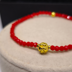 Käsitööna valminud kaitse- ja õnnekäevõru