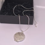 Medalion "Aja Ratas"